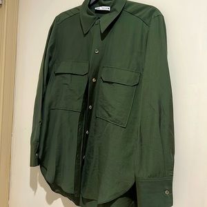Green button up with brown buttons